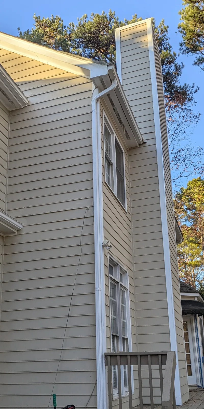 Completed exterior chimney siding and carpentry work